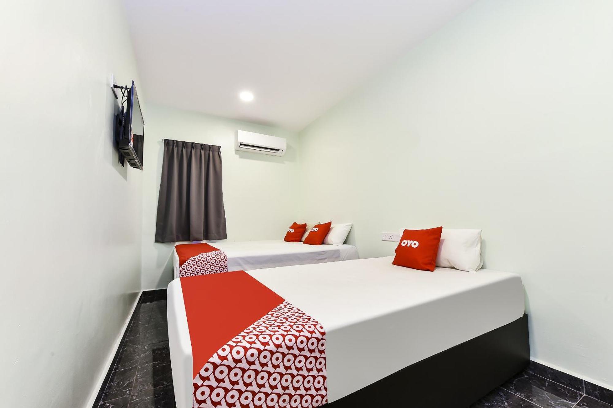Oyo 90445 Th Hotel Bahau Ngoại thất bức ảnh